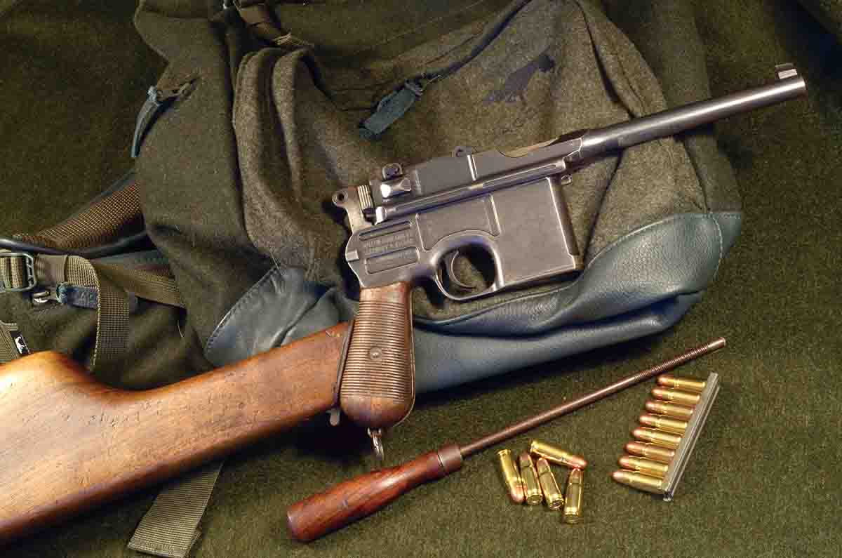 The Mauser C96 Broomhandle 7.63 Mauser with detachable stock, combination takedown tool and cleaning rod was a popular combination that saw action in virtually all wars and insurrections of the twentieth century.